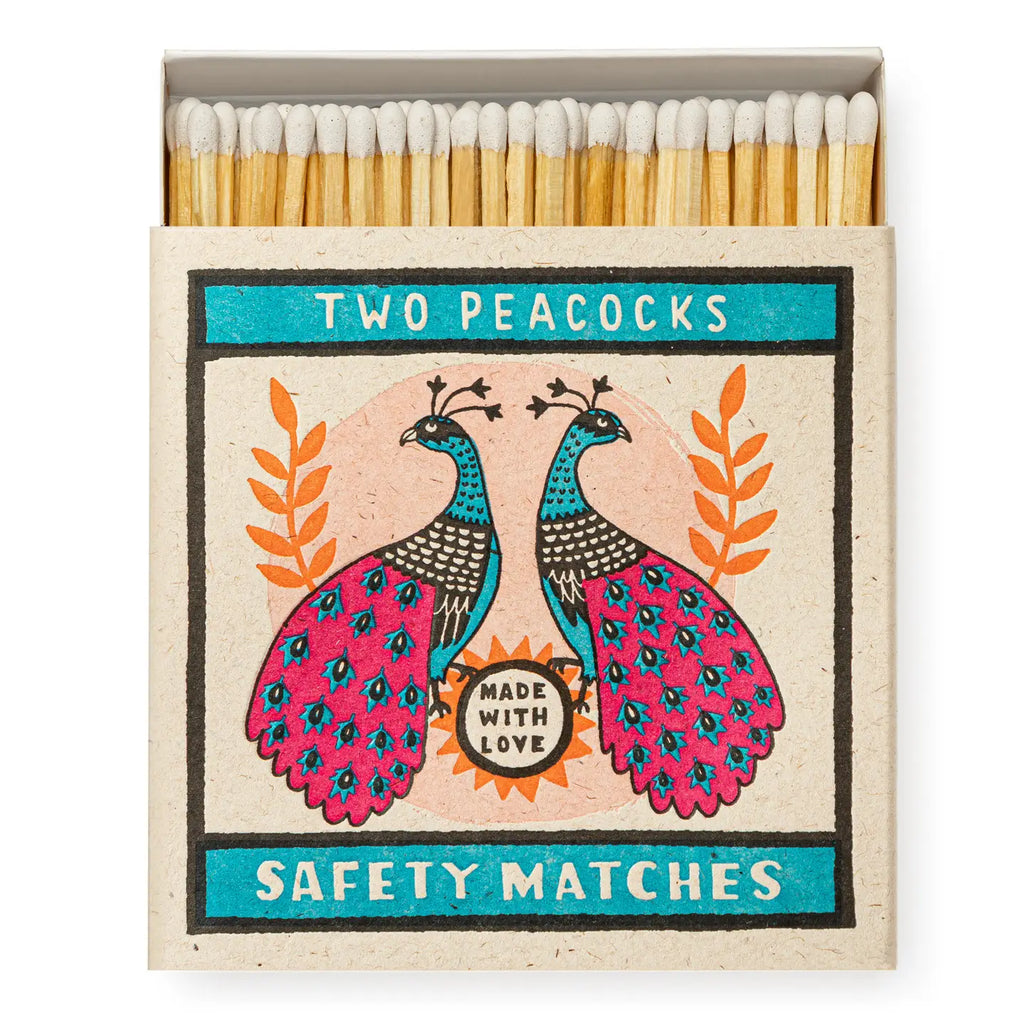 Matches box with peacock design and 'Two Peacocks' branding on a white background