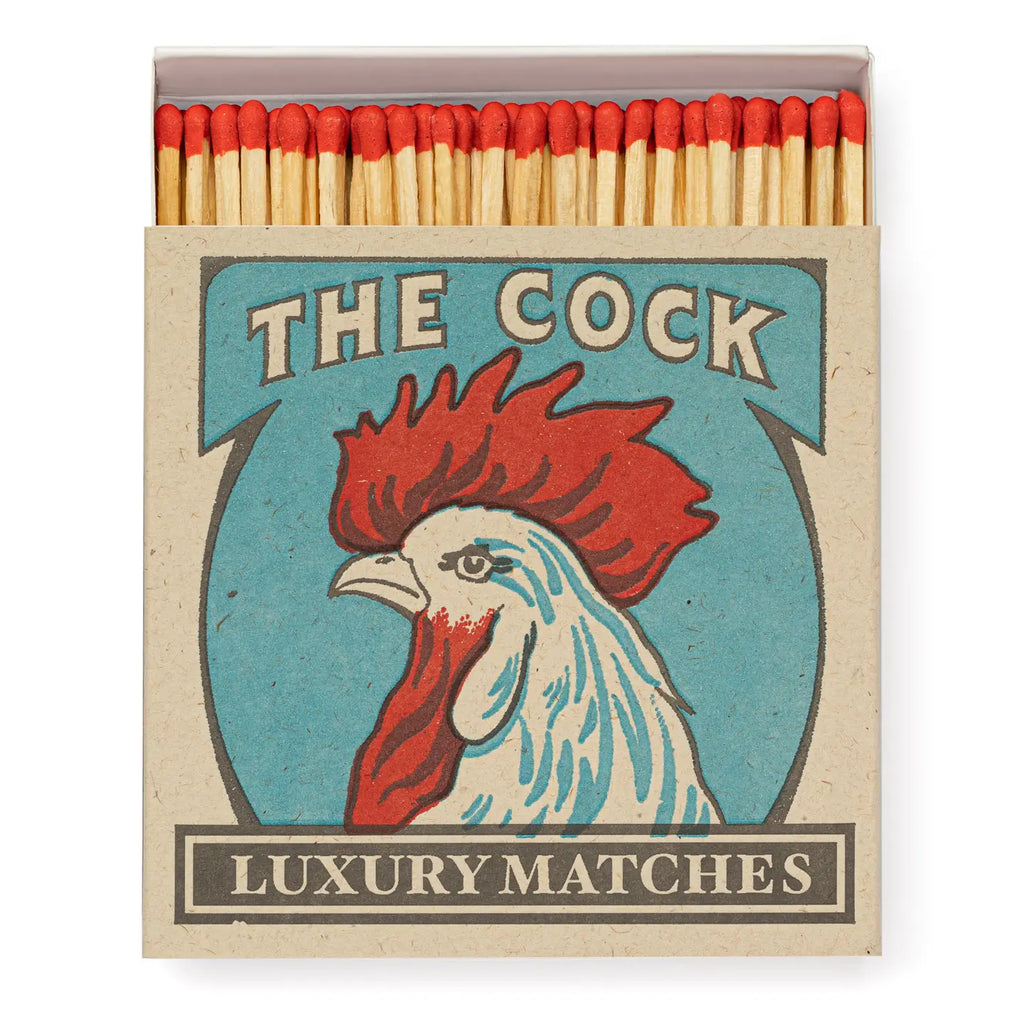 Matches box with rooster illustration and 'The Cock Luxury Matches' text